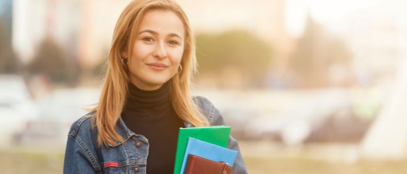 Young woman with books