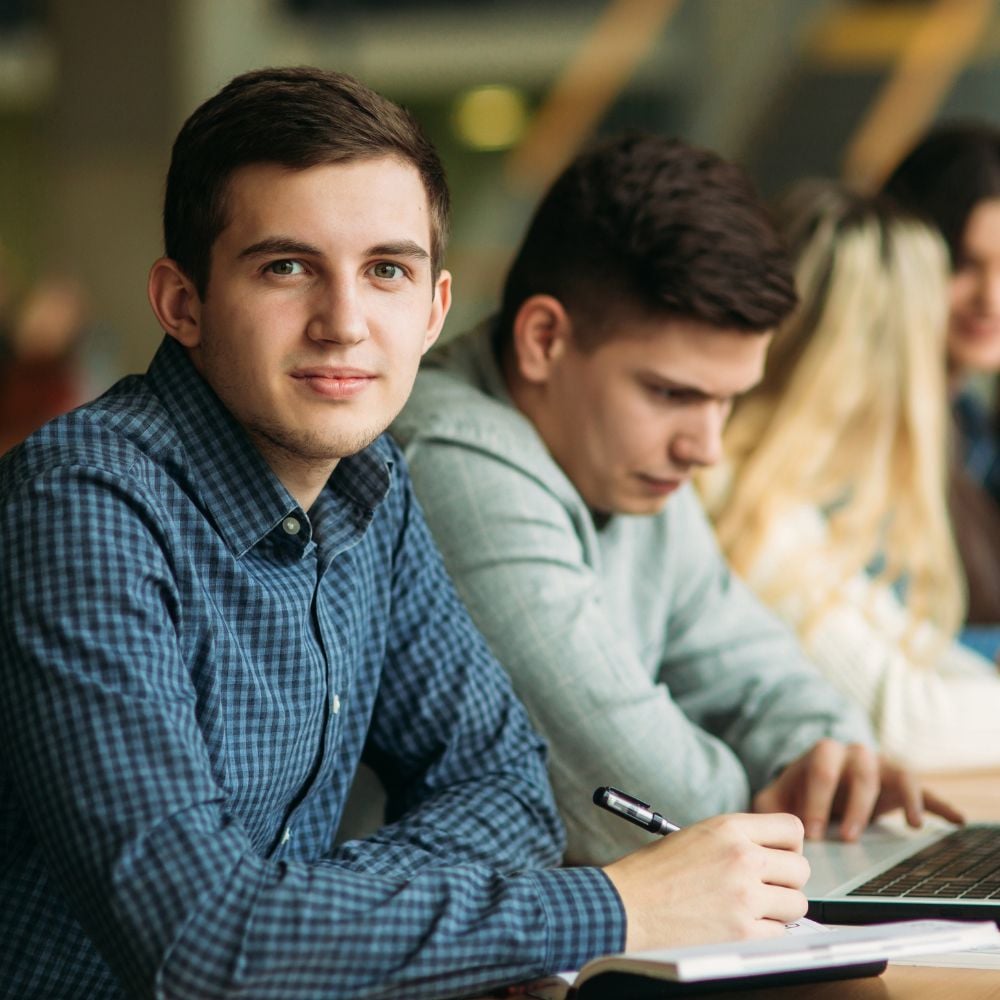 Student in plaid shirt 