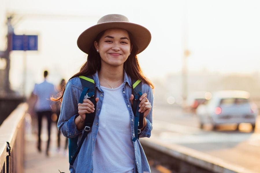 smiling student with hat 