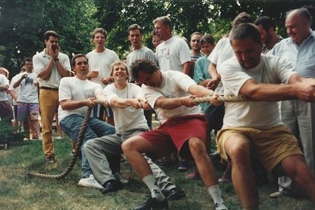 Employees playing tug of war